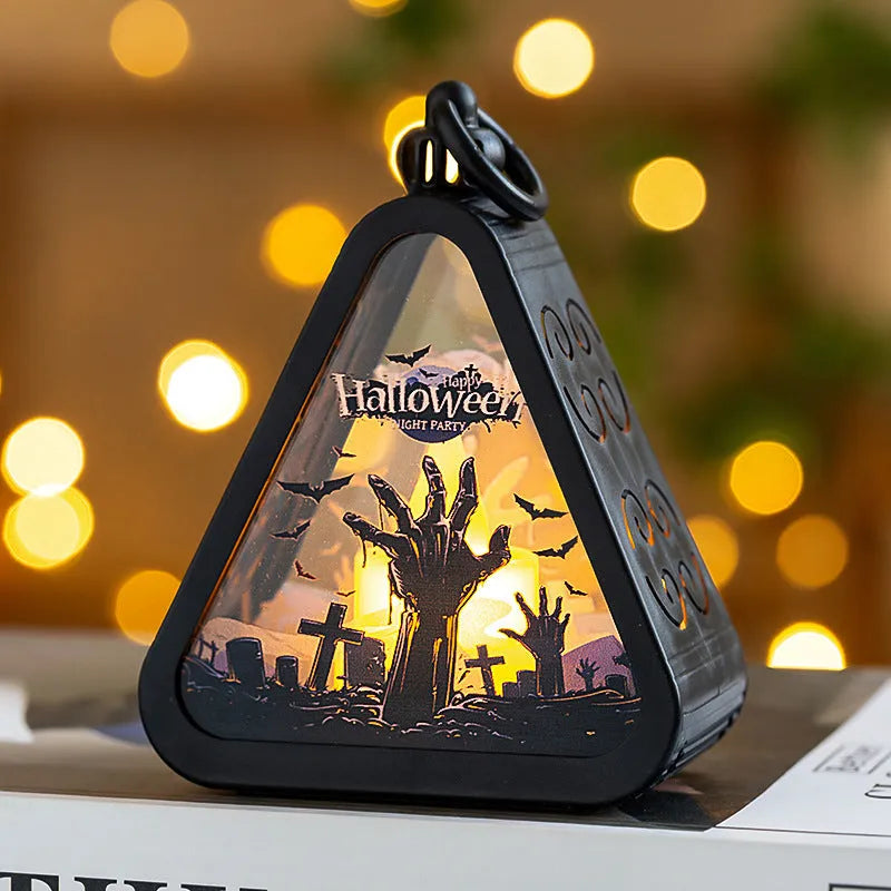 Portable Halloween pumpkin lamp decoration measuring 8.9cm with four colour designs