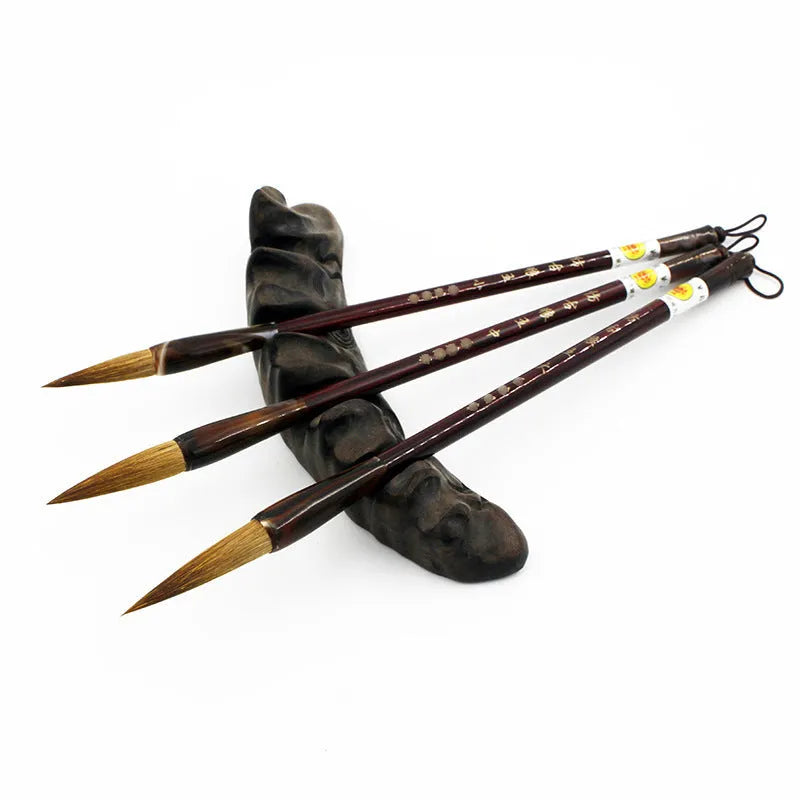 Traditional Chinese wolf hair calligraphy brush with steel rod, styles include large, medium, and trumpet.