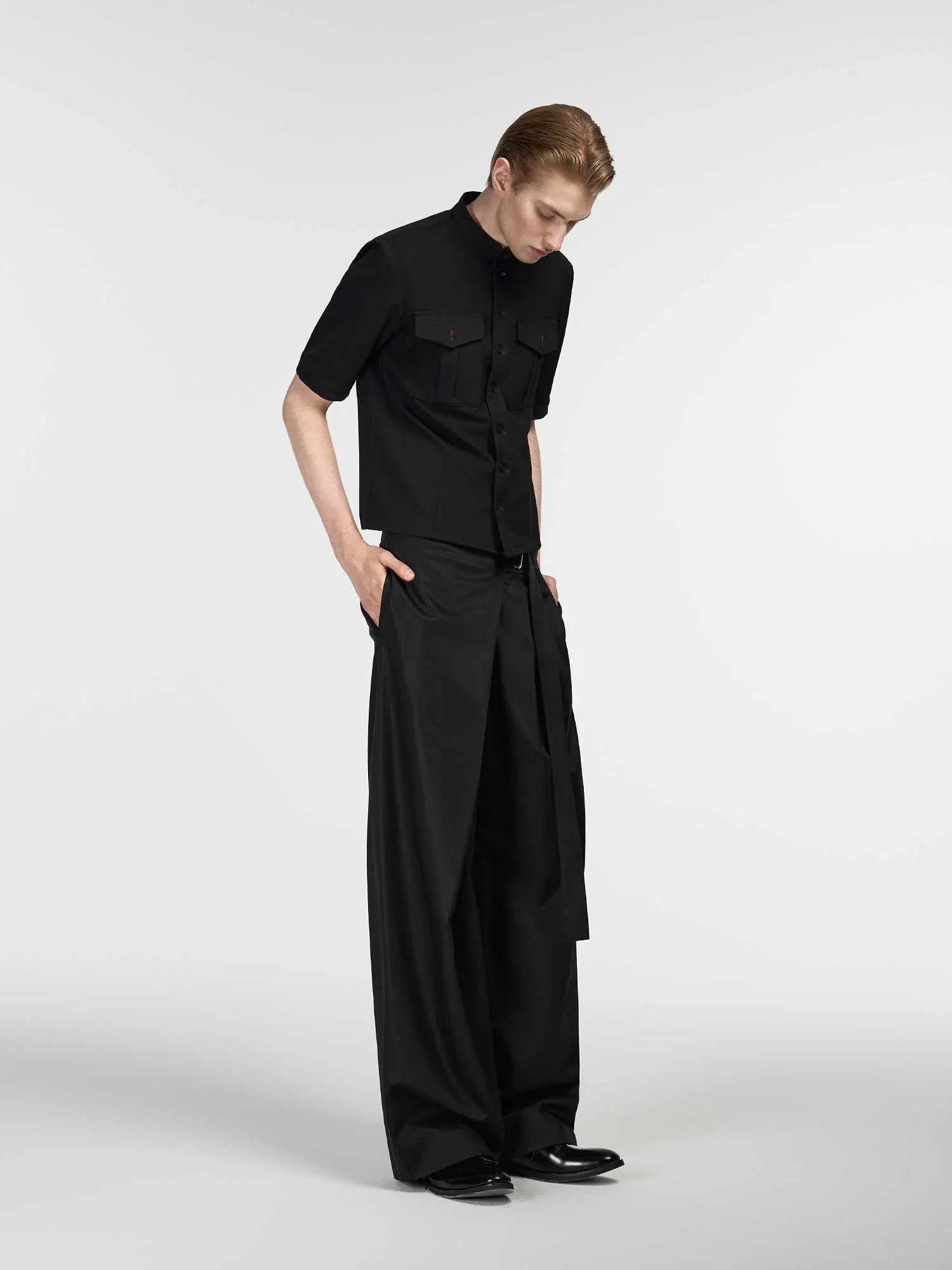 Black straight-leg trousers with single pleat front and adjustable mid waist