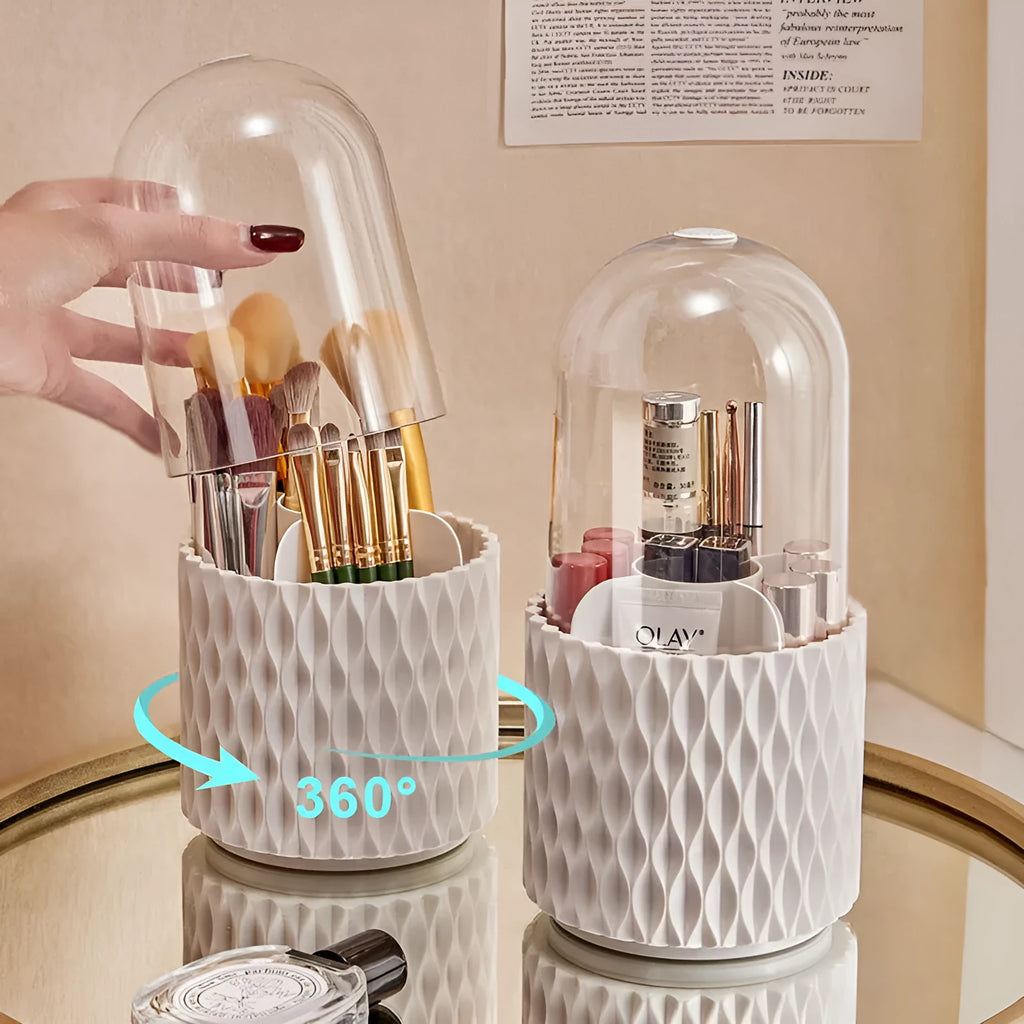 White transparent acrylic makeup brush holder with lid on a desktop, showing rotating base.