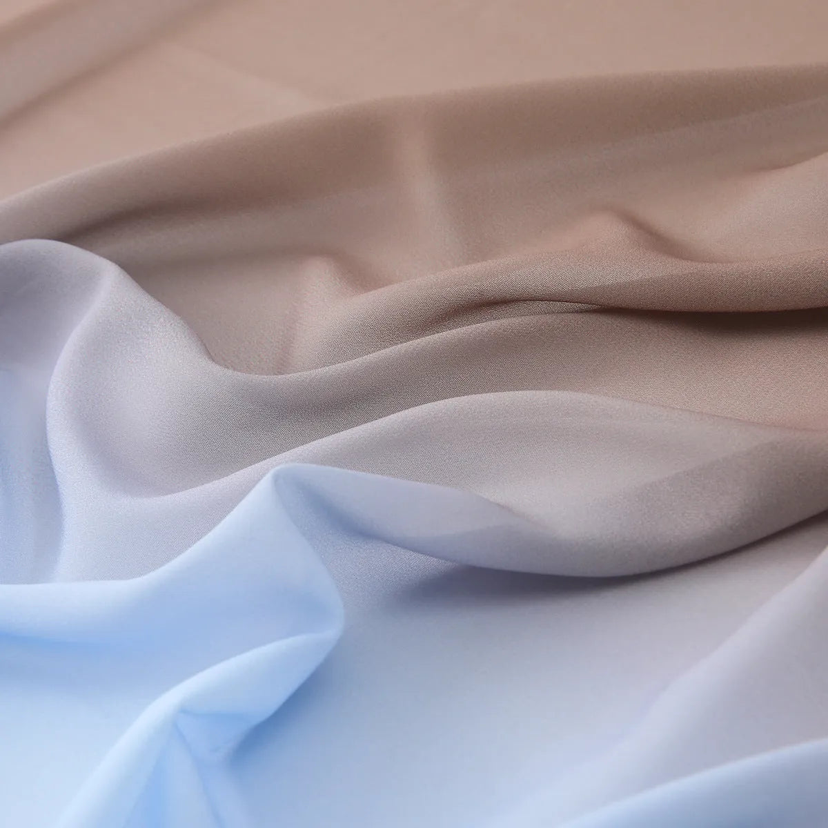 Long light blue chiffon scarf draped showing its 175cm length and 70cm width.