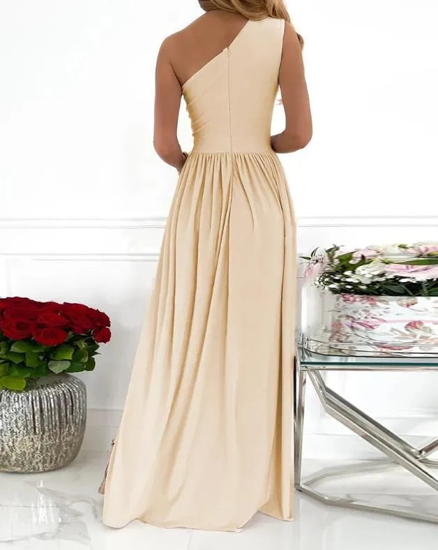 Women's one shoulder maxi dress with high split, in soft fabric, shown in apricot colour.