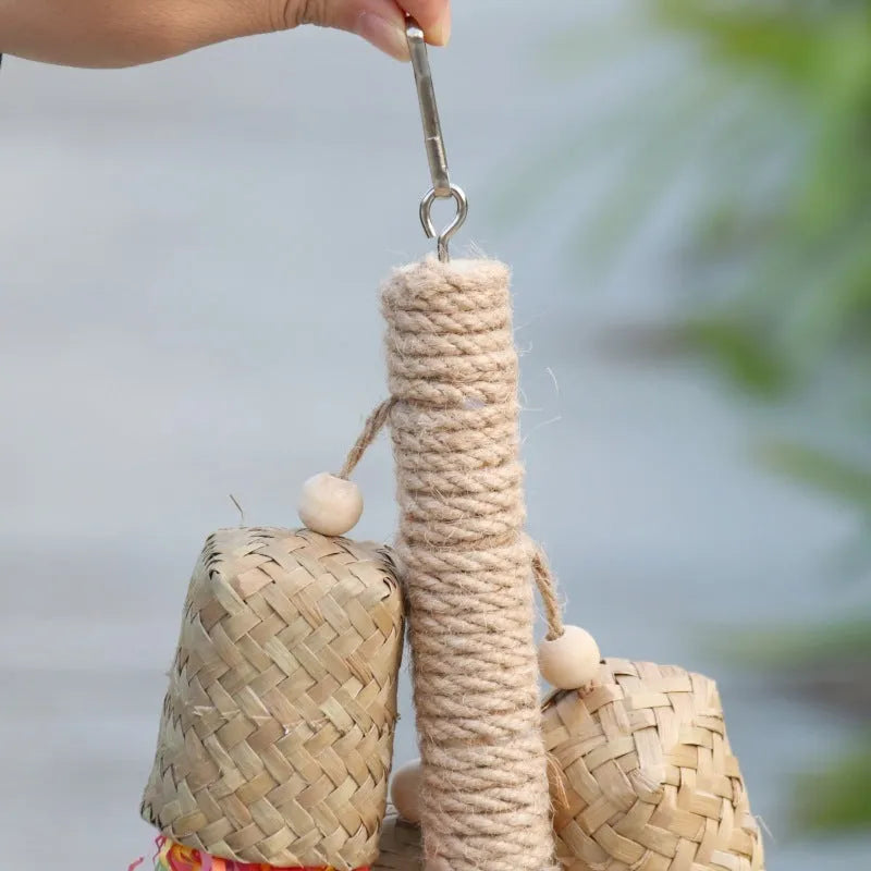 Wood and sisal rope shredded paper bird toy for parrots measuring 15cm by 35cm