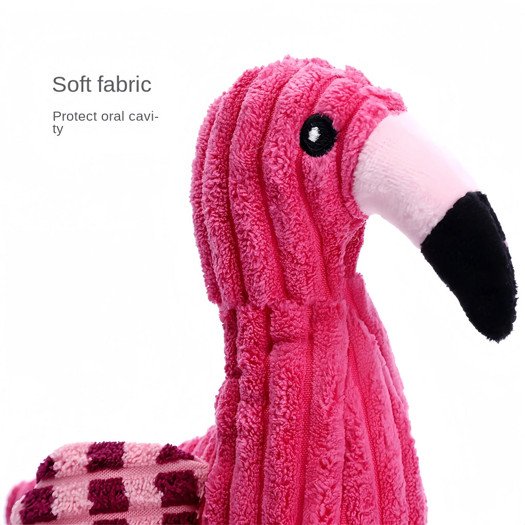 Pink animal-shaped plush dog toy with corduroy material and squeaker inside