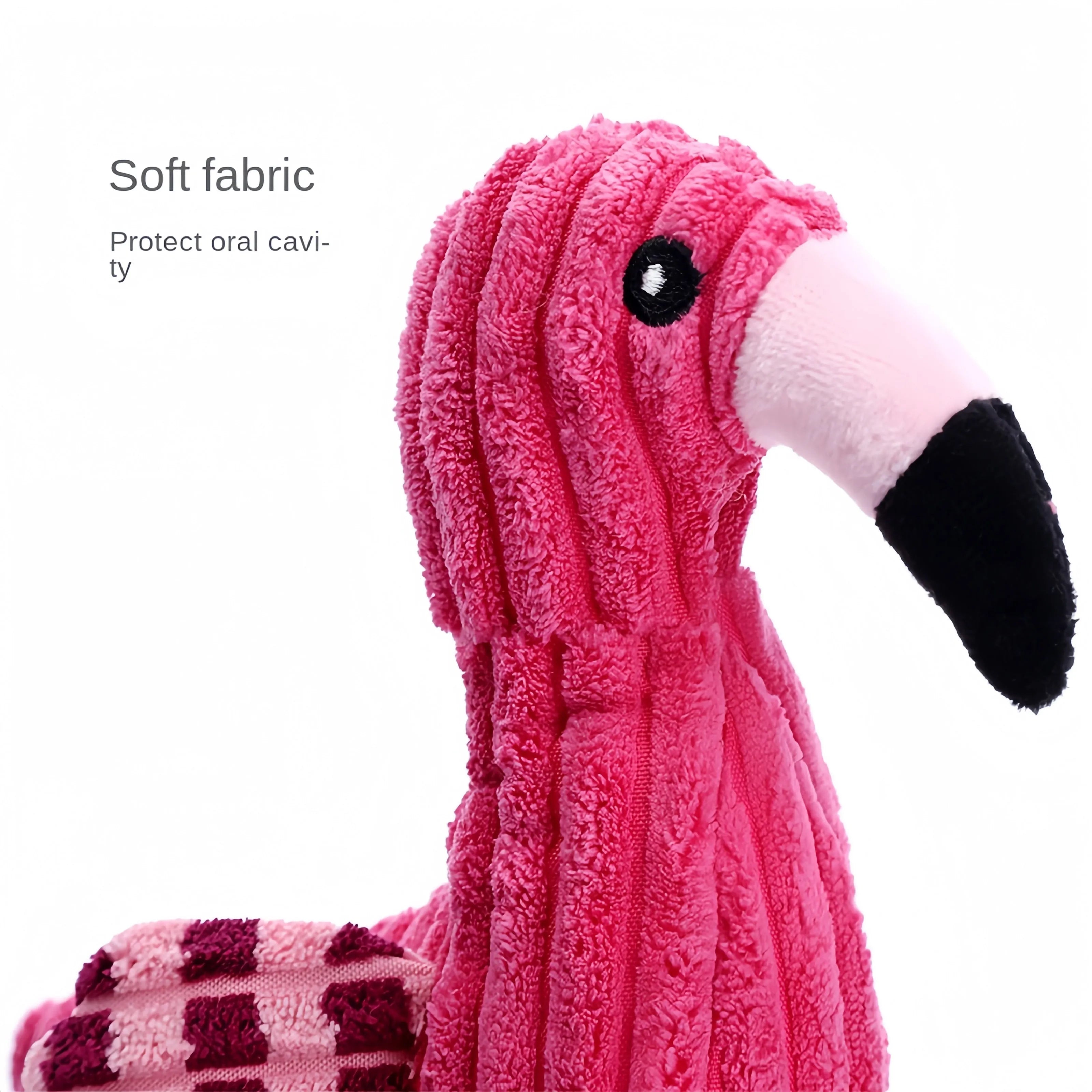 Pink animal-shaped plush dog toy with corduroy material and squeaker inside