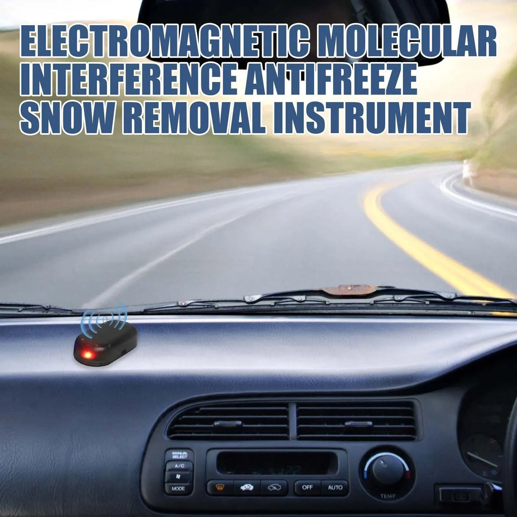 Black handheld car deicer and snow melting tool on car dashboard