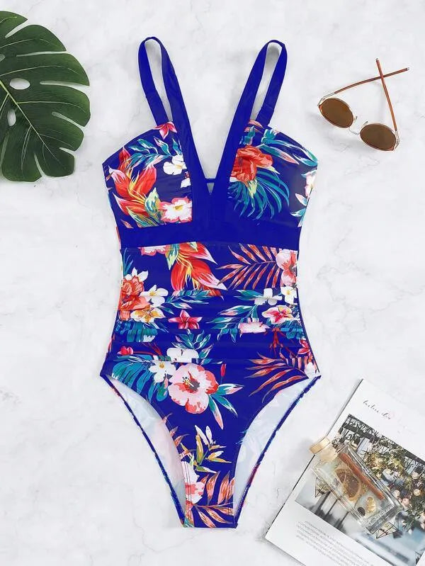 Women's floral pattern backless one-piece swimsuit on a hanger