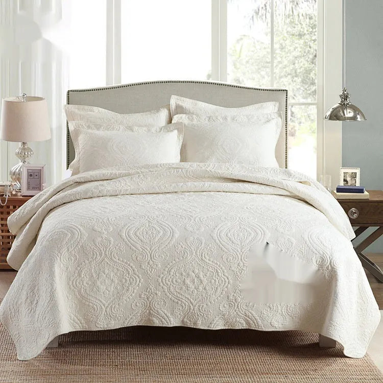 Pure cotton bedding set with damascus pattern showing embroidery details and quilted finish on bed