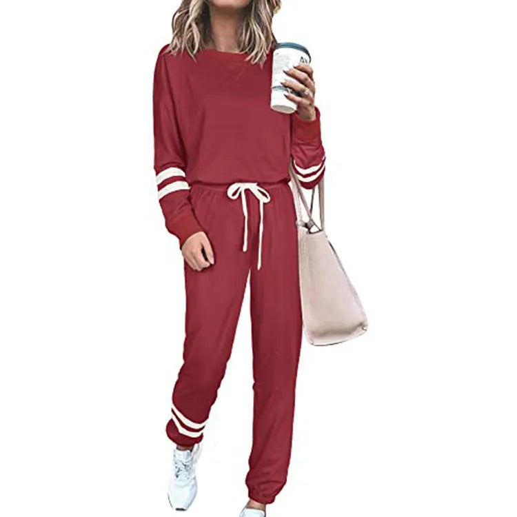 Women's plus size casual suit set in loose-fitting design with long sleeves, available in seven solid colours