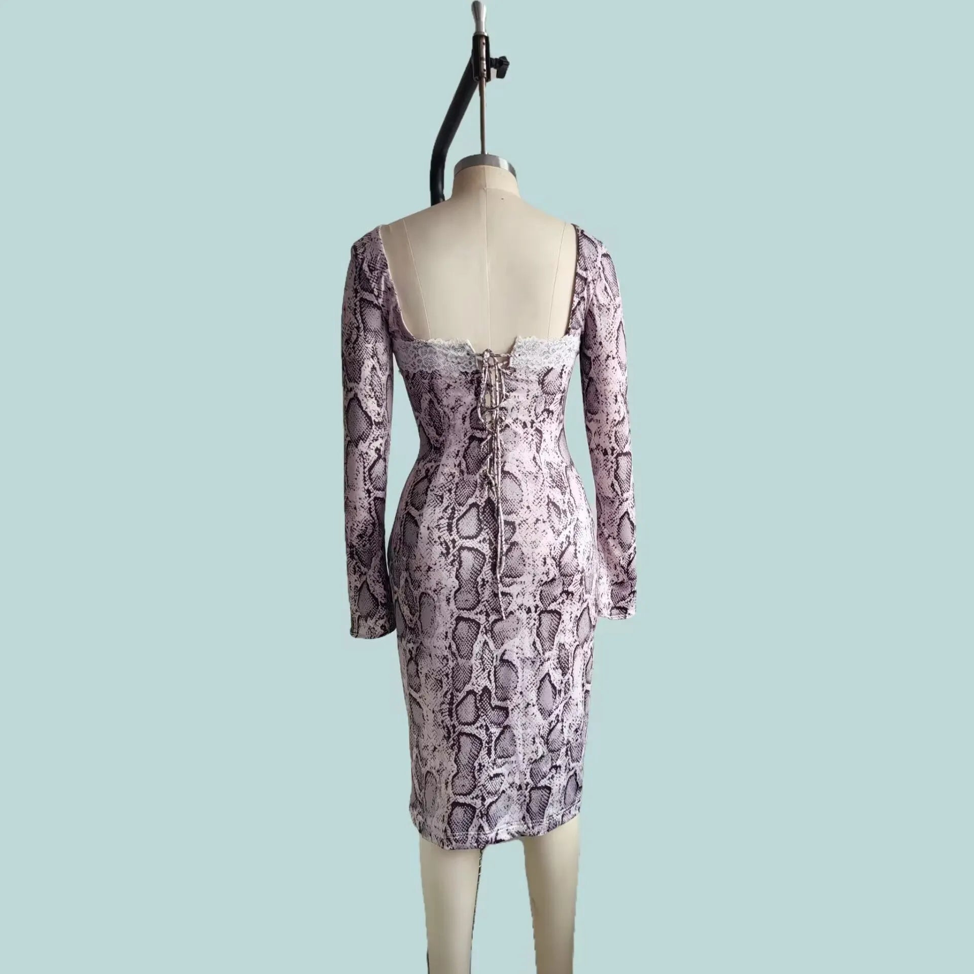 Grey long sleeve digital printed lace dress with 3D pattern and A-line skirt on a mannequin.