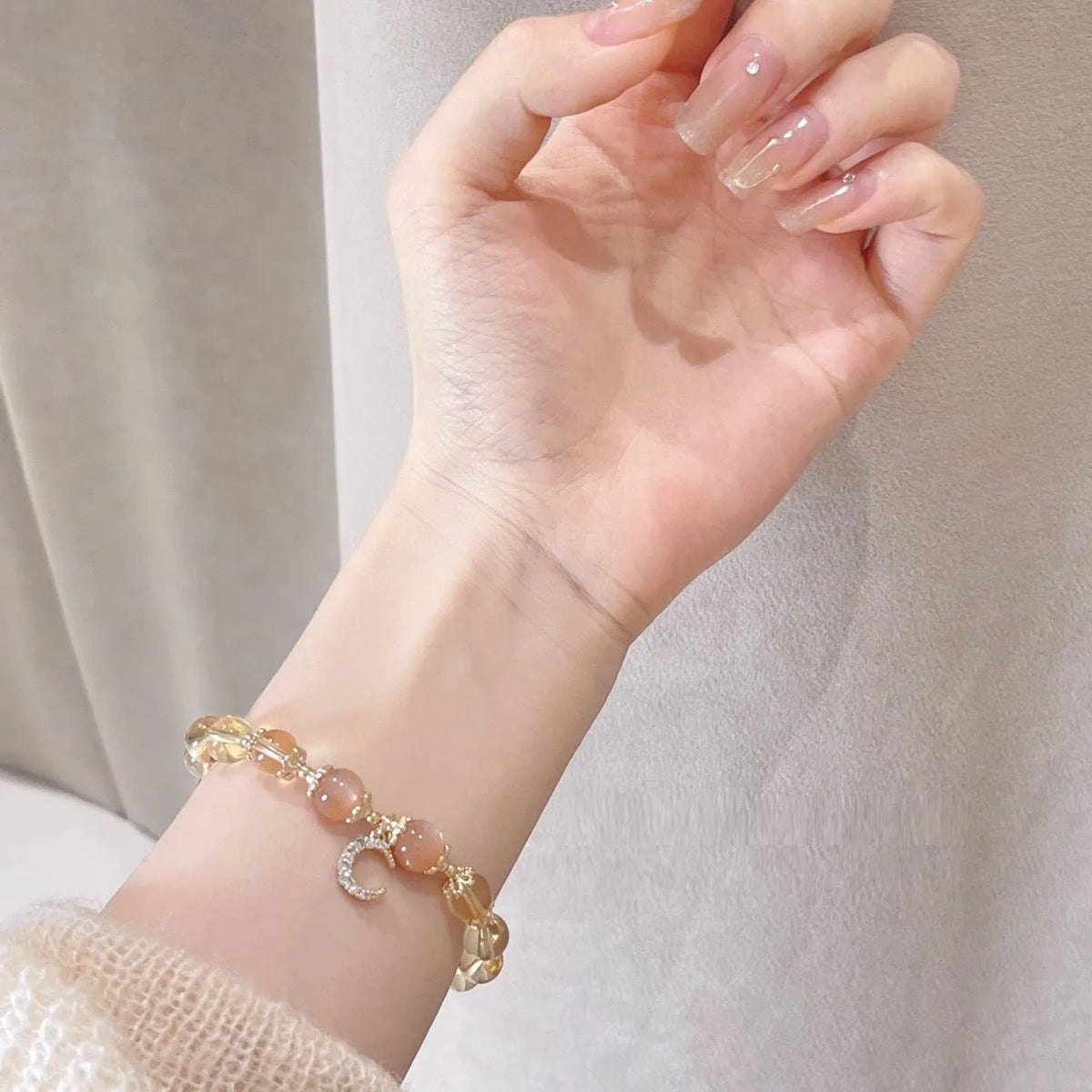 Chinese style women's crystal bracelet with moonstone golden sun stone design and gold electroplating