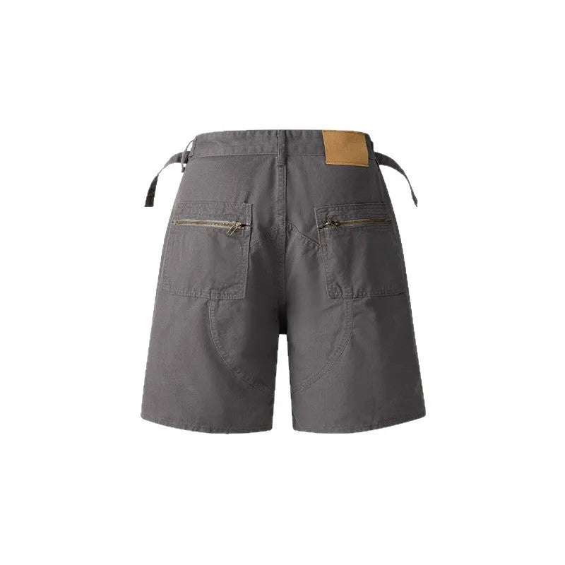 Retro workwear shorts in washed cotton cloth with zipper fastening and loose fifth pants length fit