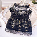 Golden ruffled gothic princess skirt costume being worn by a small dog or cat.
