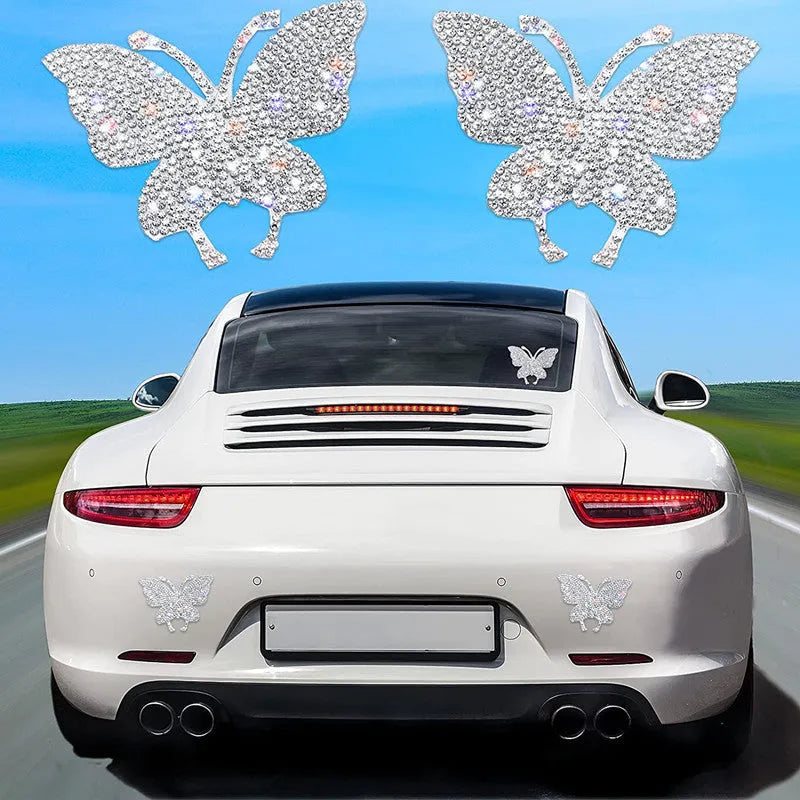Glass car sticker decal showing bear paw or butterfly design choice on clear background.