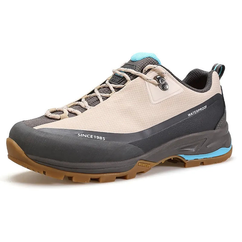 Men's low-top leather mesh hiking boots in black with non-slip rubber sole and lace-up front.