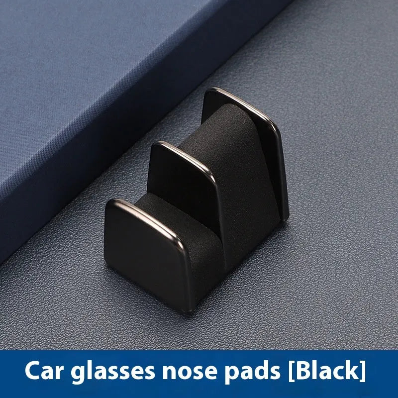 Car dashboard glasses holder in zinc alloy with leather trim, measuring 3.7x3.2x2.5cm