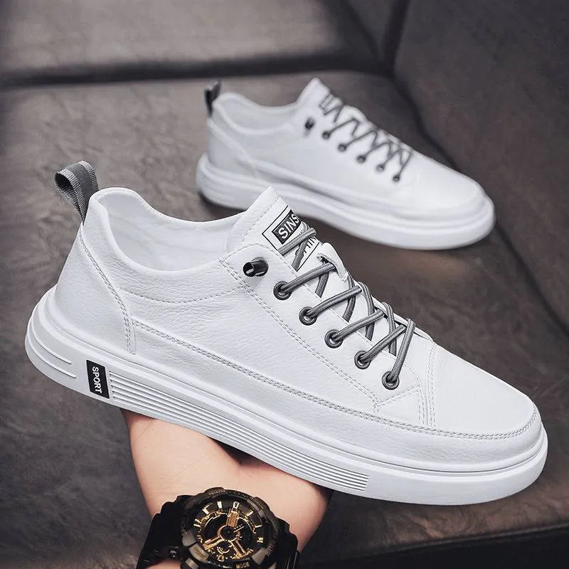Men's white casual shoes with round toe and low heel on a flat breathable sole