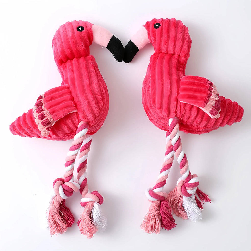 Pink animal-shaped plush dog toy with corduroy material and squeaker inside