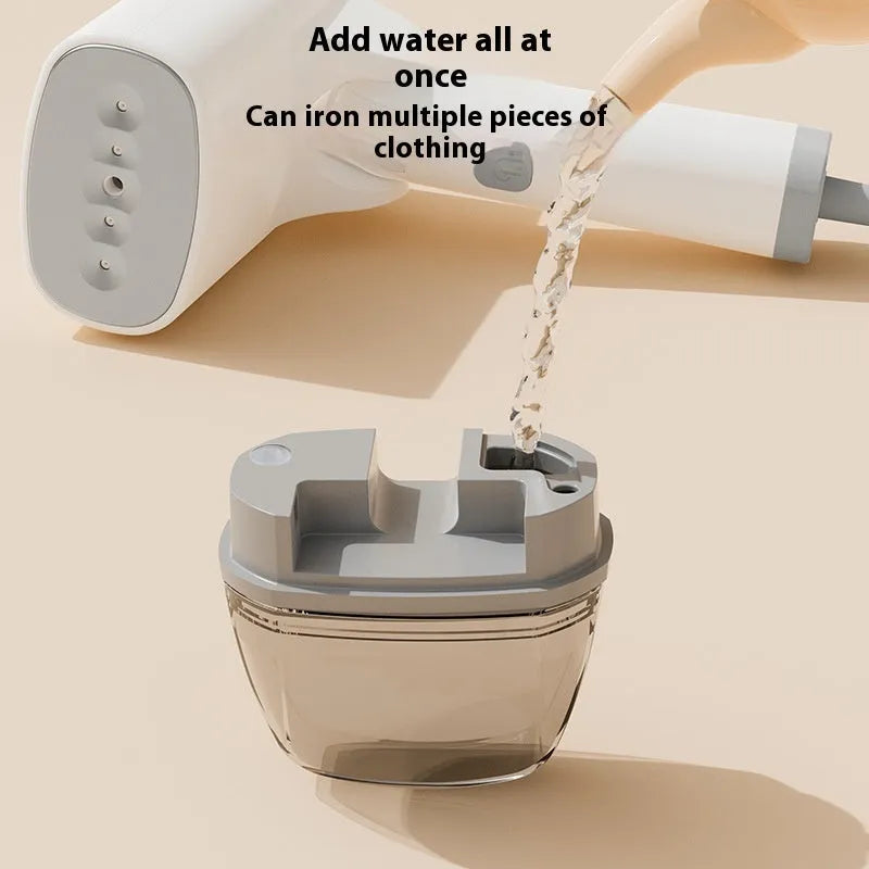Blue handheld garment steamer with mechanical controls and compact design for portable clothes care
