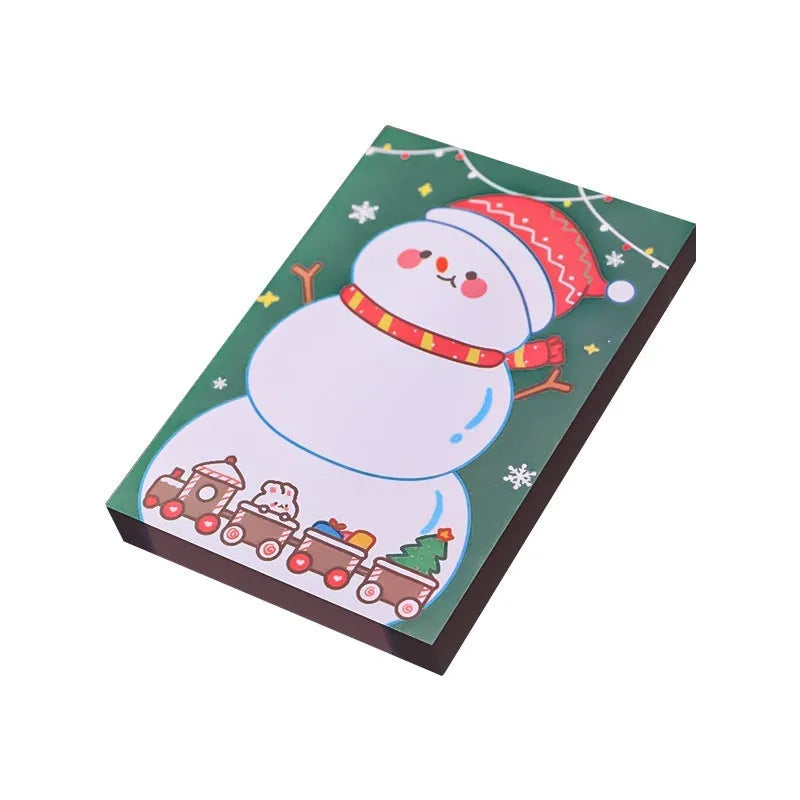 Christmas sticky notes book with cartoon designs of Santa, snowman, elf, gift, house, sled, crystal ball, and bear