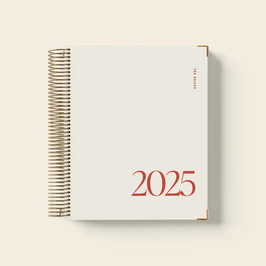 Cherry red daily schedule spiral notebook with coil binding and dated sections
