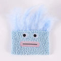 Colourful catnip plush toy shaped like an exploding head with a big open mouth