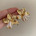 Gold H1795 plated floral earrings with Seiko treatment, hand-crafted niche style jewellery.
