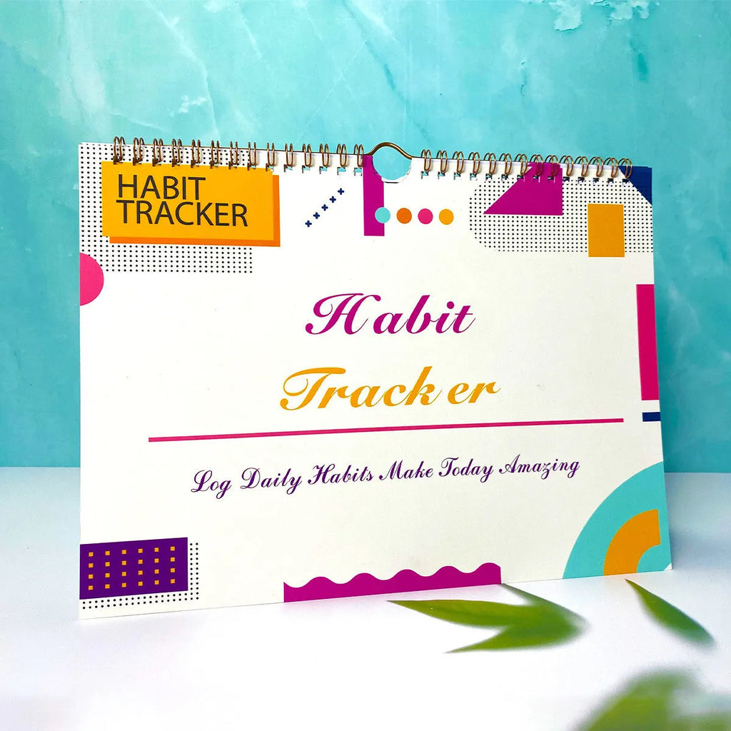 Habit tracking notebook open showing internal pages with 21x28cm dimensions in flower white cover colour