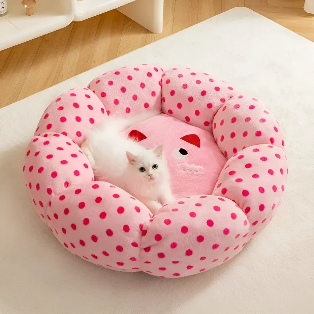 Pink dot fabric cat bed cushion shown in two size options for pets up to 20 pounds