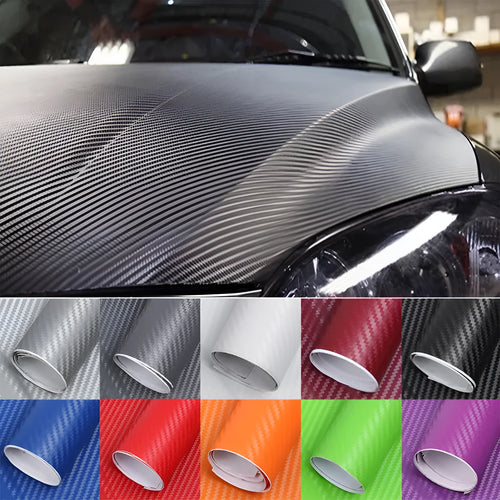 Roll of 3D carbon fibre car sticker showing black, silver, blue, and yellow colour options