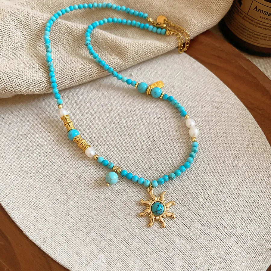 French royal style freshwater pearl necklace with blue sun stone pendant on clavicle chain
