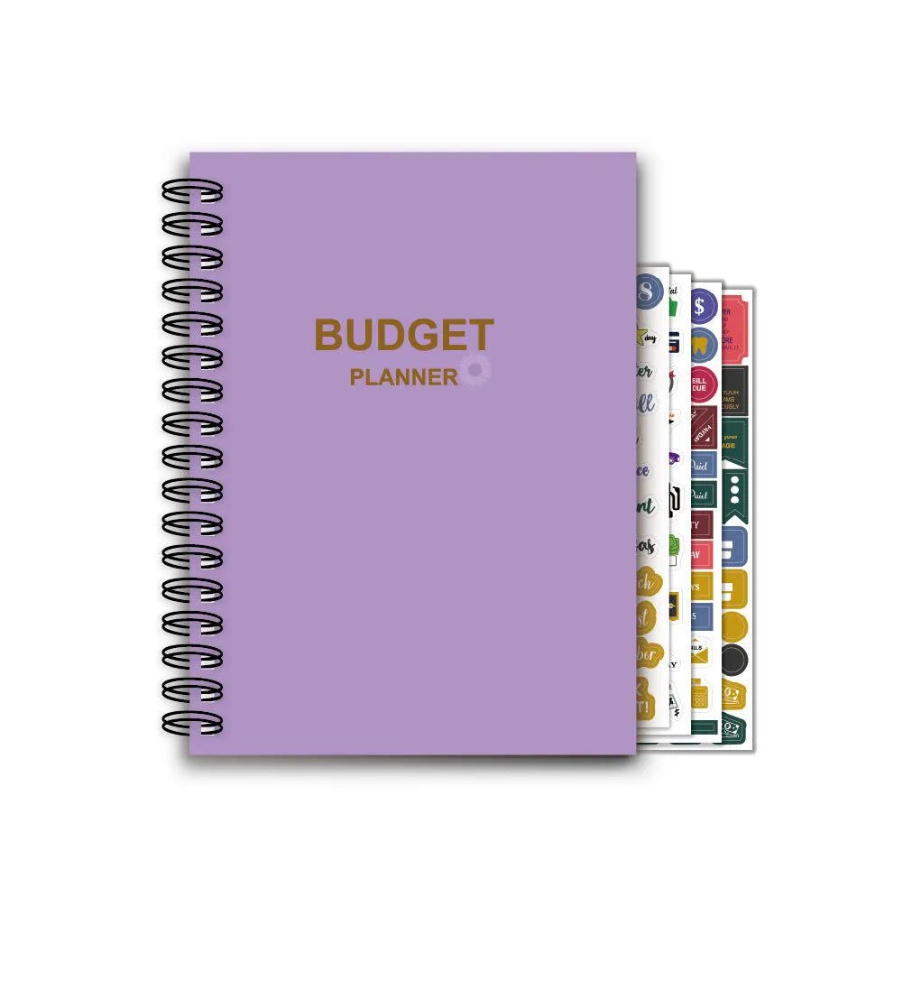 J12 purple coil-bound budget notebook with pen, sticker sheets, and paper clips for financial planning.