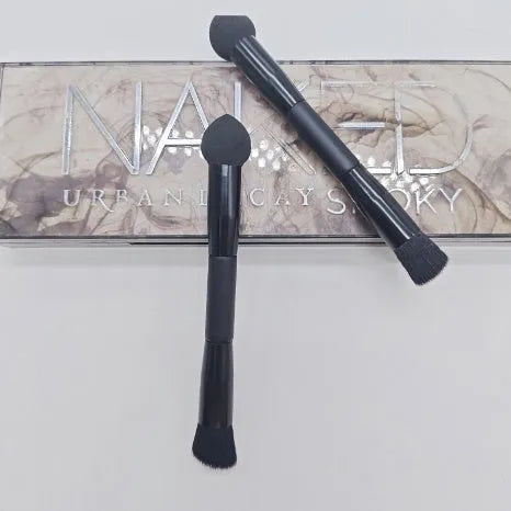 Double-headed makeup brush with miter sponge tip and artificial fibre bristles on wooden handle