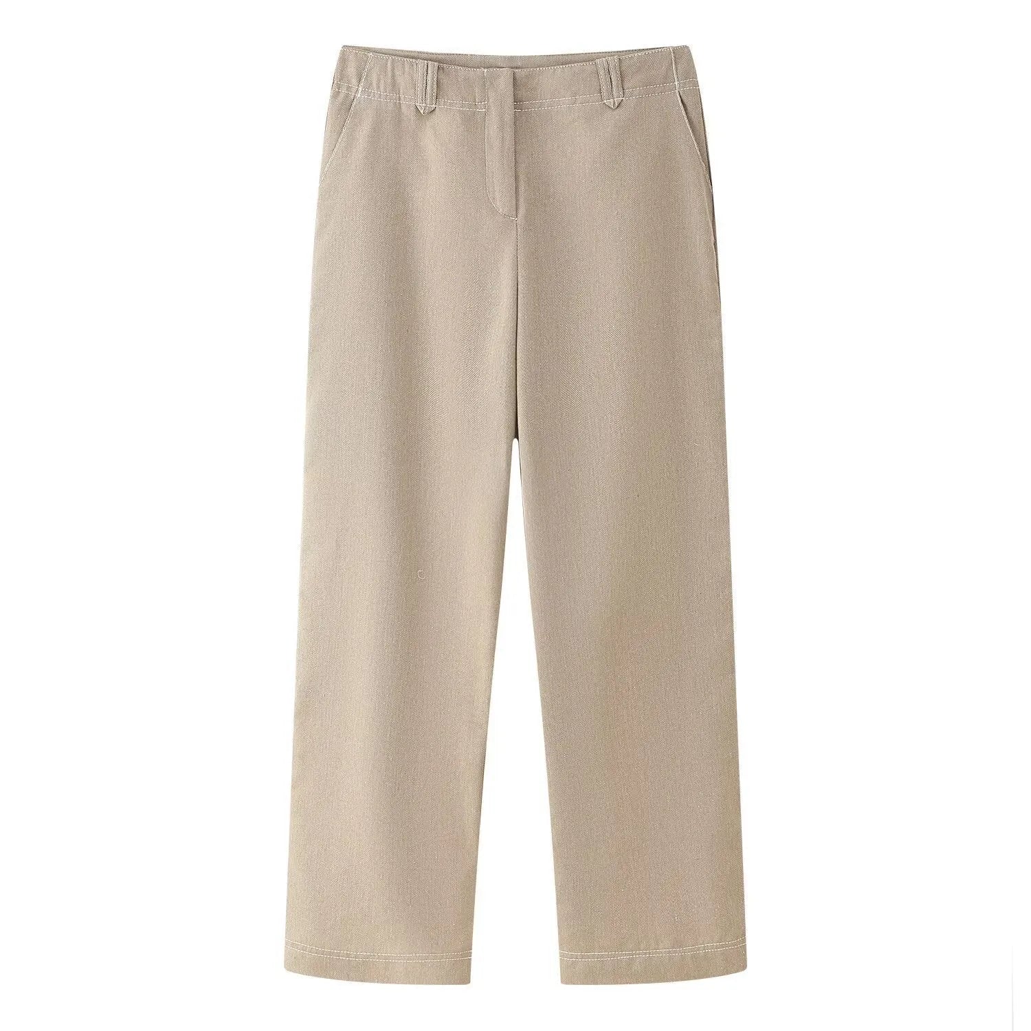 Women's light coloured herringbone pattern summer suit with jacket and straight-leg trousers, showing 3D pattern effect and embroidery details.