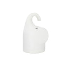 Elephant shaped silicone night light with warm 3000k LED glow on a bedside table