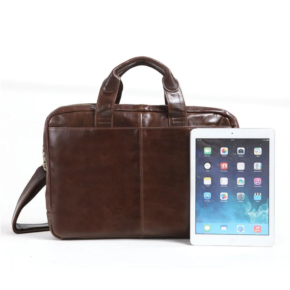 Brown leather business briefcase with 18-inch laptop compartment and professional design