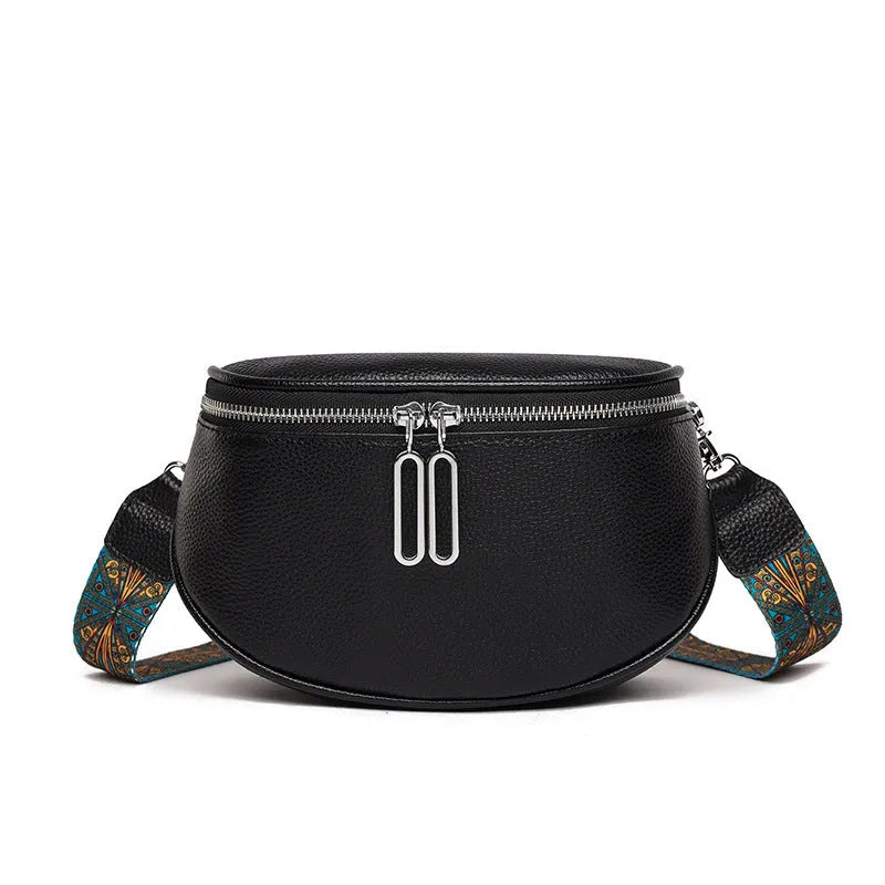 Women's saddle-shaped PU leather messenger bag in black with single shoulder strap and sewing line detailing