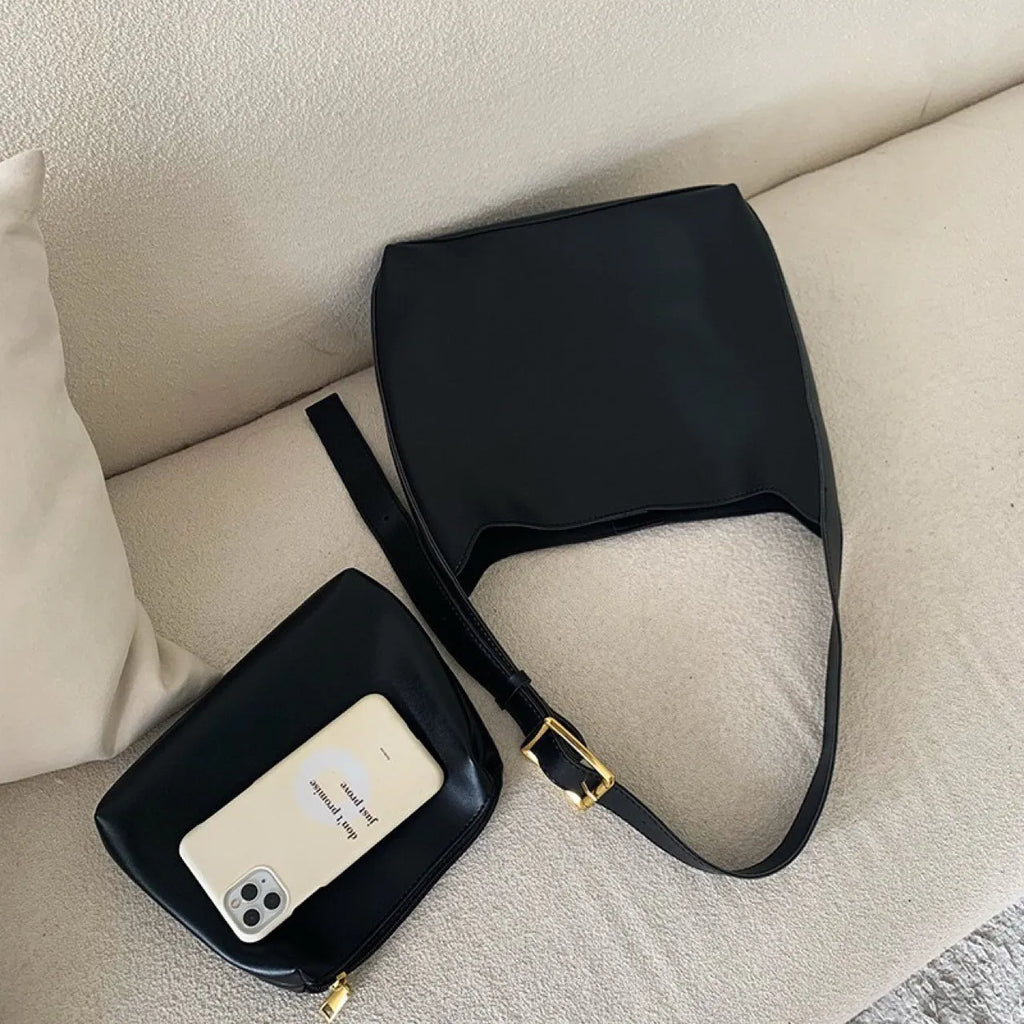Women's soft PU shoulder bag with swing threads detail in black or brown colour
