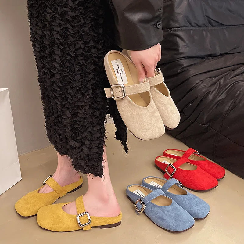 Women's flat closed toe half slipper in apricot colour with square toe and rubber sole.