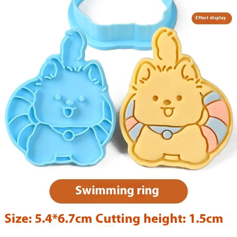 Plastic 3D biscuit mould with cartoon puppy designs including birthday hats and swimming rings