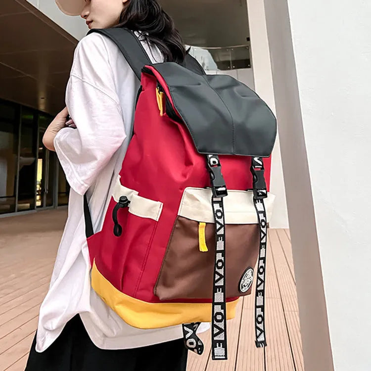 Oxford cloth backpack in black, green or red with 32cm width and 46cm height dimensions