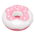 Donut-shaped dog chew toy in pink colour with textured surface for dental cleaning