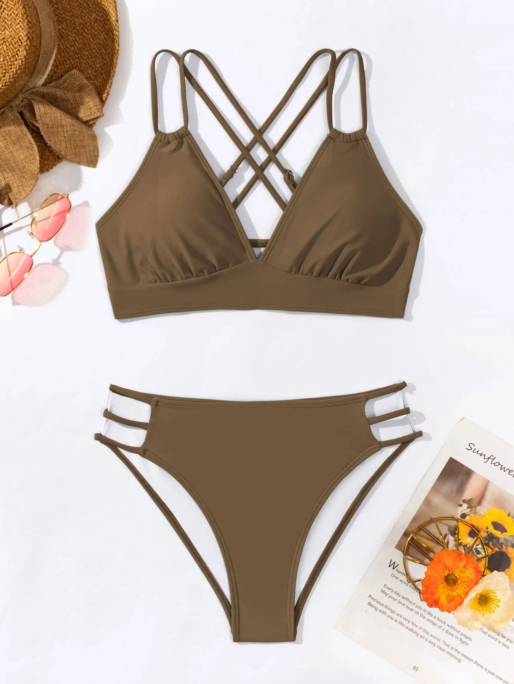 Women's black V-neck halter bikini with split-style bottoms on a mannequin.