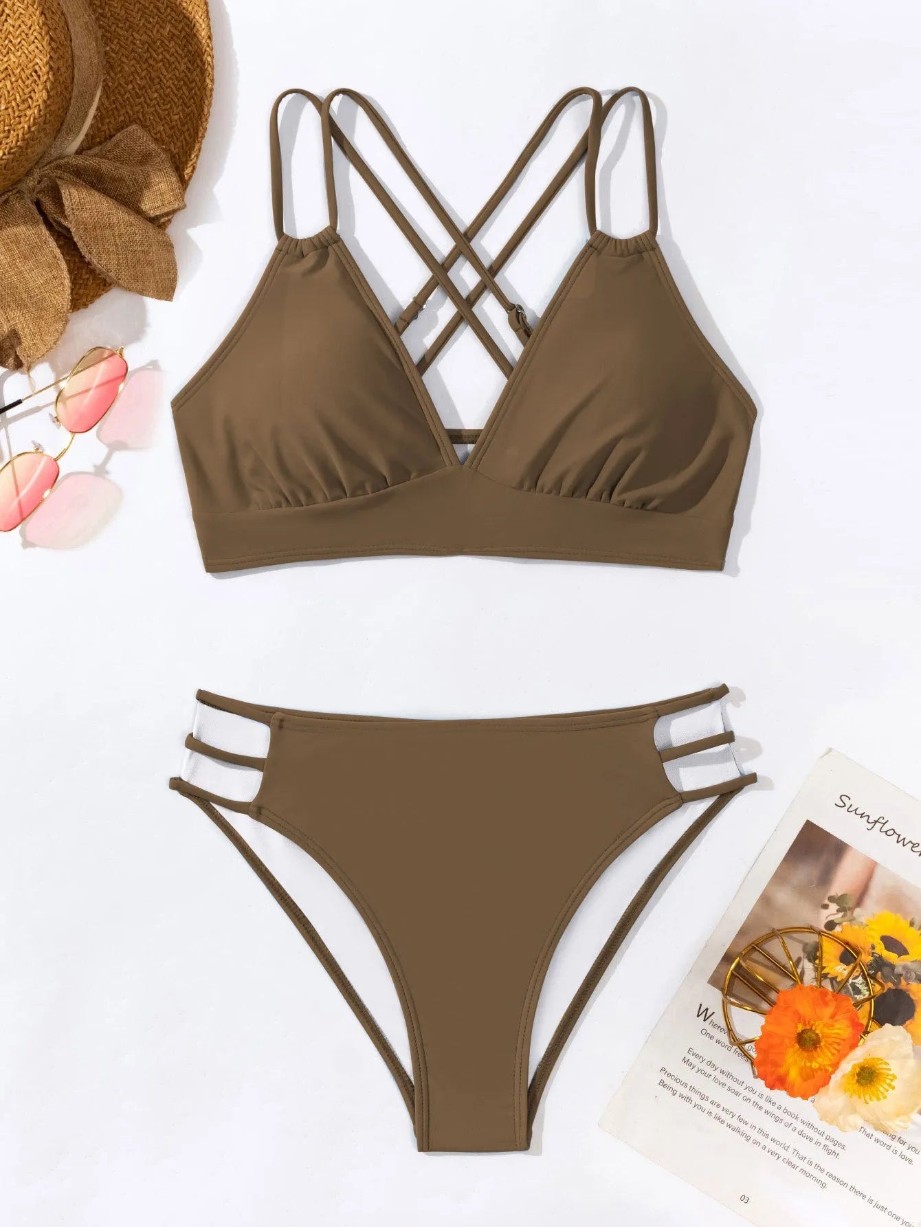 Women's black V-neck halter bikini with split-style bottoms on a mannequin.