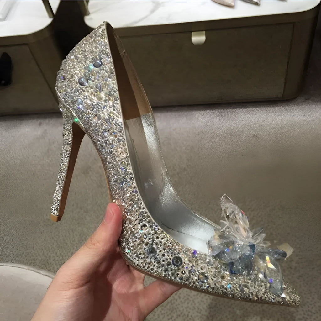 Gold and silver women's stiletto high heels with sequined pointed toes and rhinestone decoration.