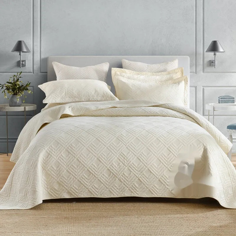Pure cotton bedding set with damascus pattern showing embroidery details and quilted finish on bed