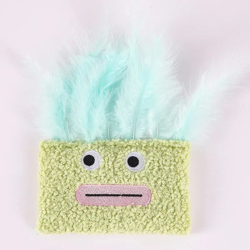 Colourful catnip plush toy shaped like an exploding head with a big open mouth