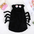 Black spider web pattern dog costume showing front view on pet