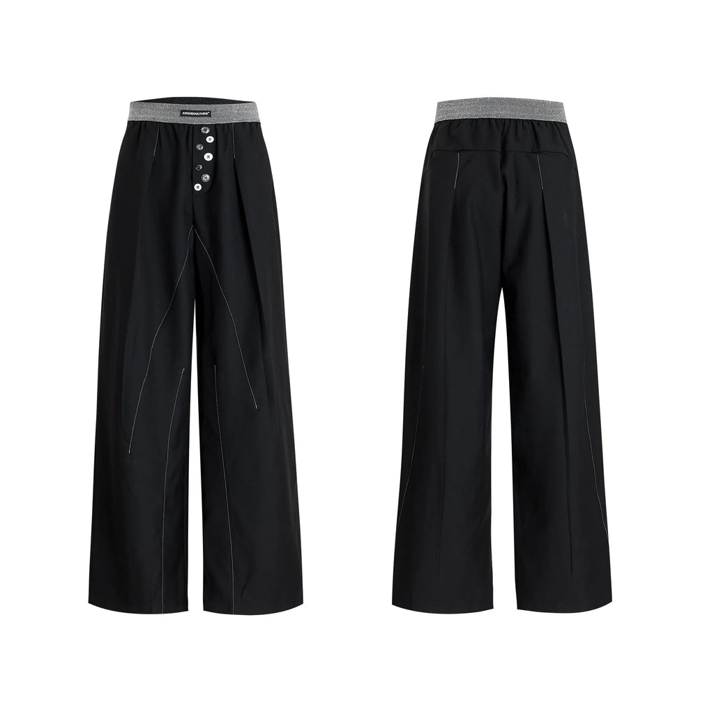 Drooping straight-leg trousers with button-open line design in black and grey colours