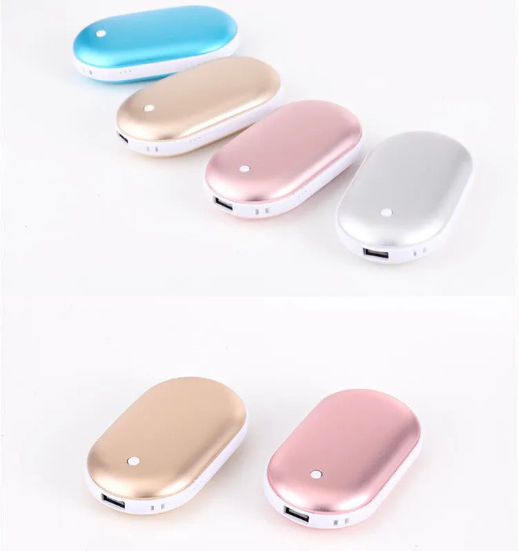 Rose gold rechargeable mini hand warmer and USB power bank two-in-one unit on a table.